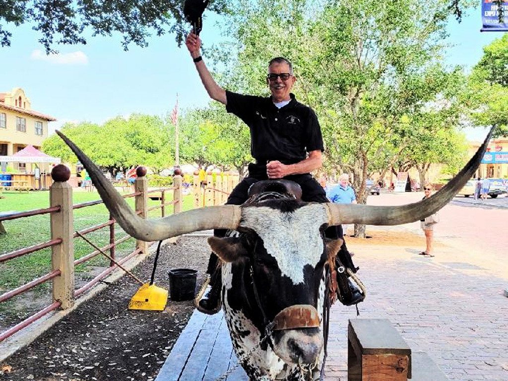 Ron Haines rides a Longhorn!